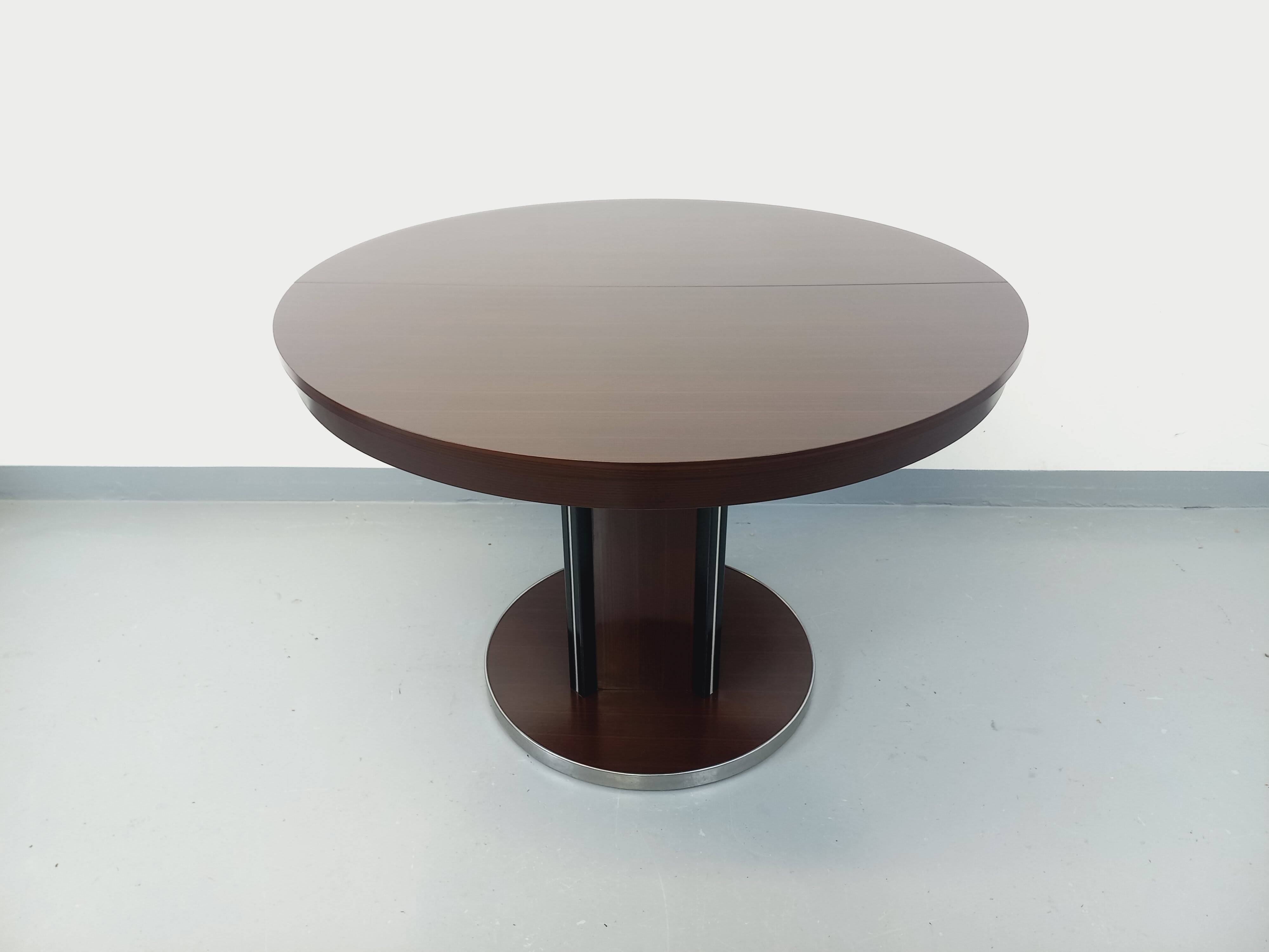 Table ronde de repas vintage en bois d’ébène et métal chromé Space Age