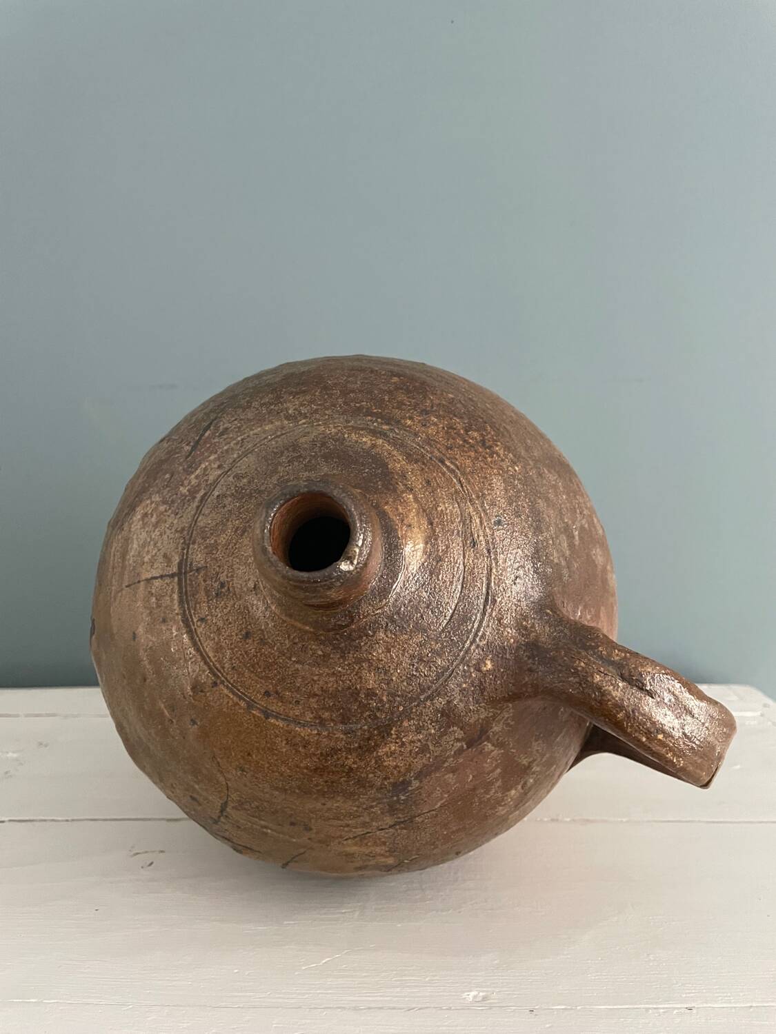 Large 19th century oil bottle in glazed earthenware