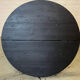Brutalist round table in burnt wood yakisugi