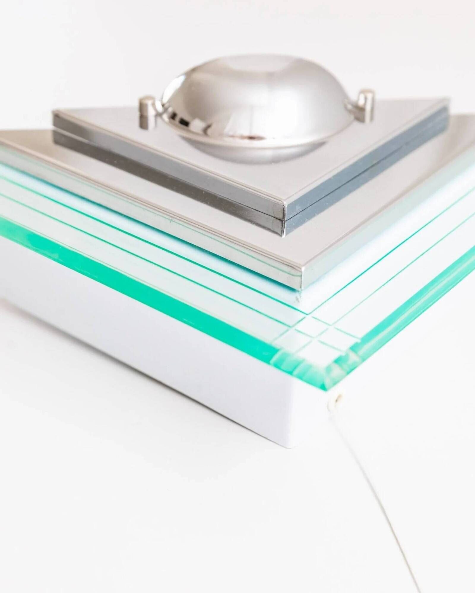 Muted green glass wall lamp with chrome metal accents, Memphis-style postmodern, 1990s