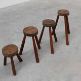 Brutalist French 1850s solid oak tripod stools with metal rim, set of 4