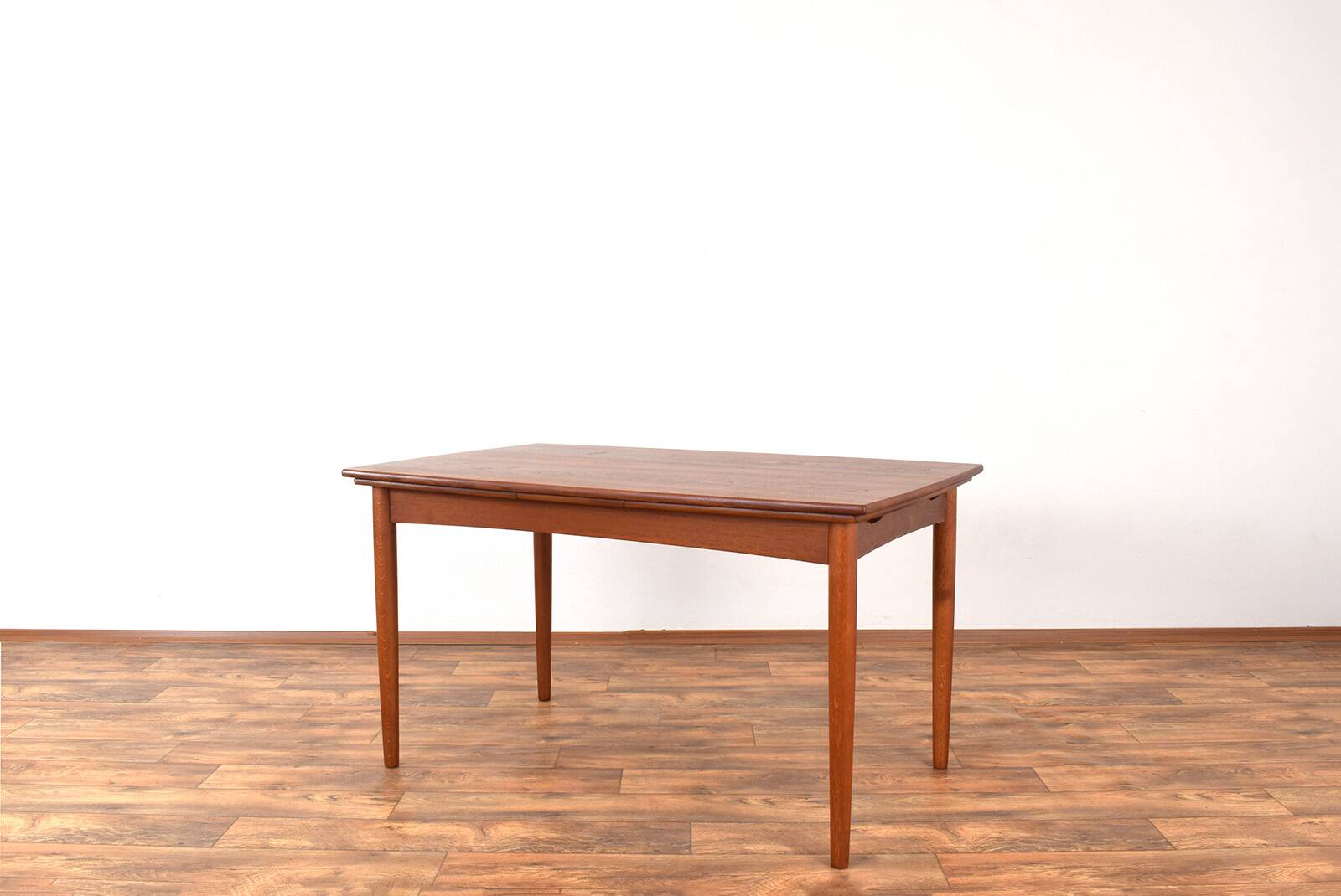 Mid-century Danish teak extendable dining table, 1960s.