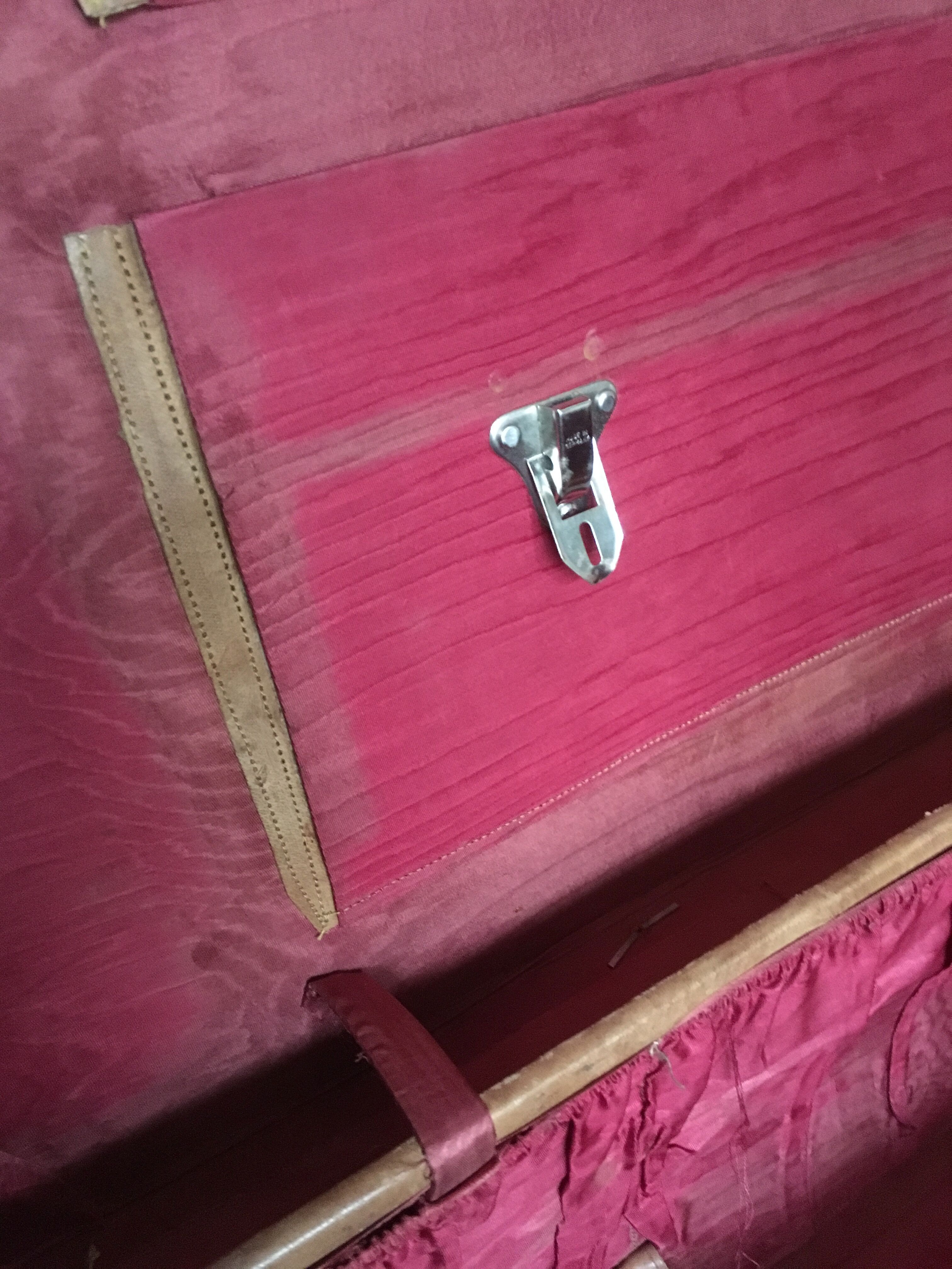 suitcase of leather with labels of palaces