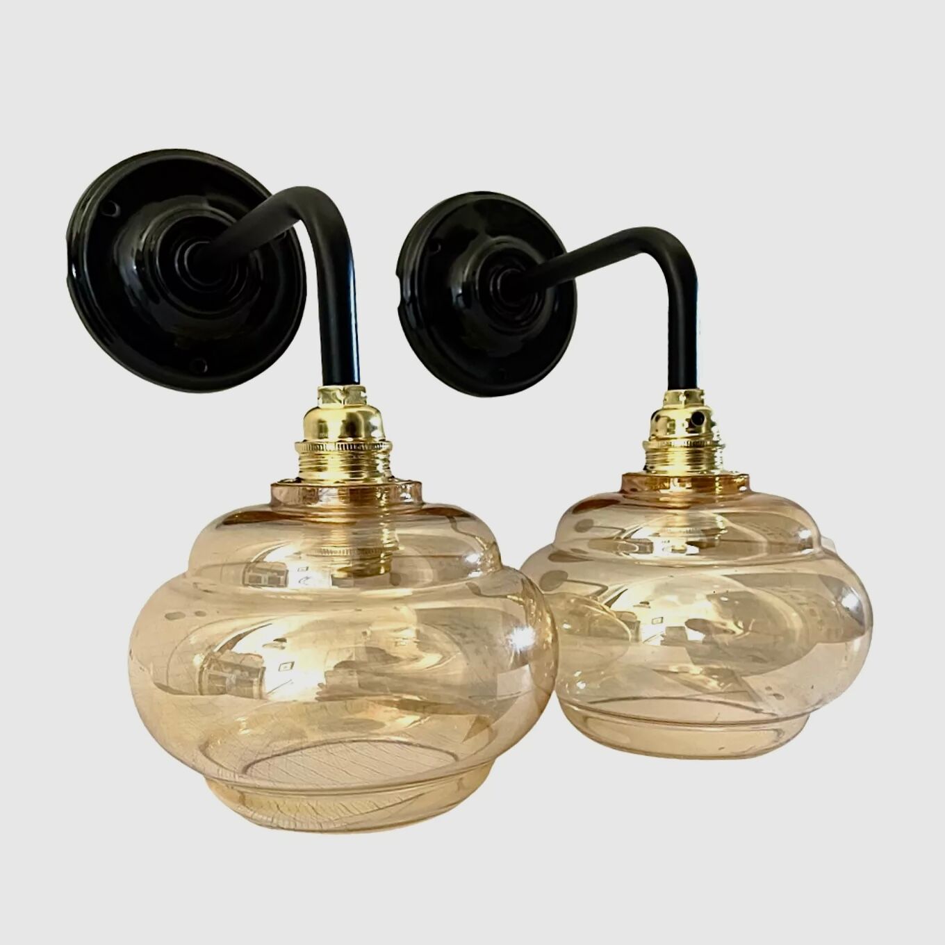 Pair of vintage sconces in electrified golden glass to nine