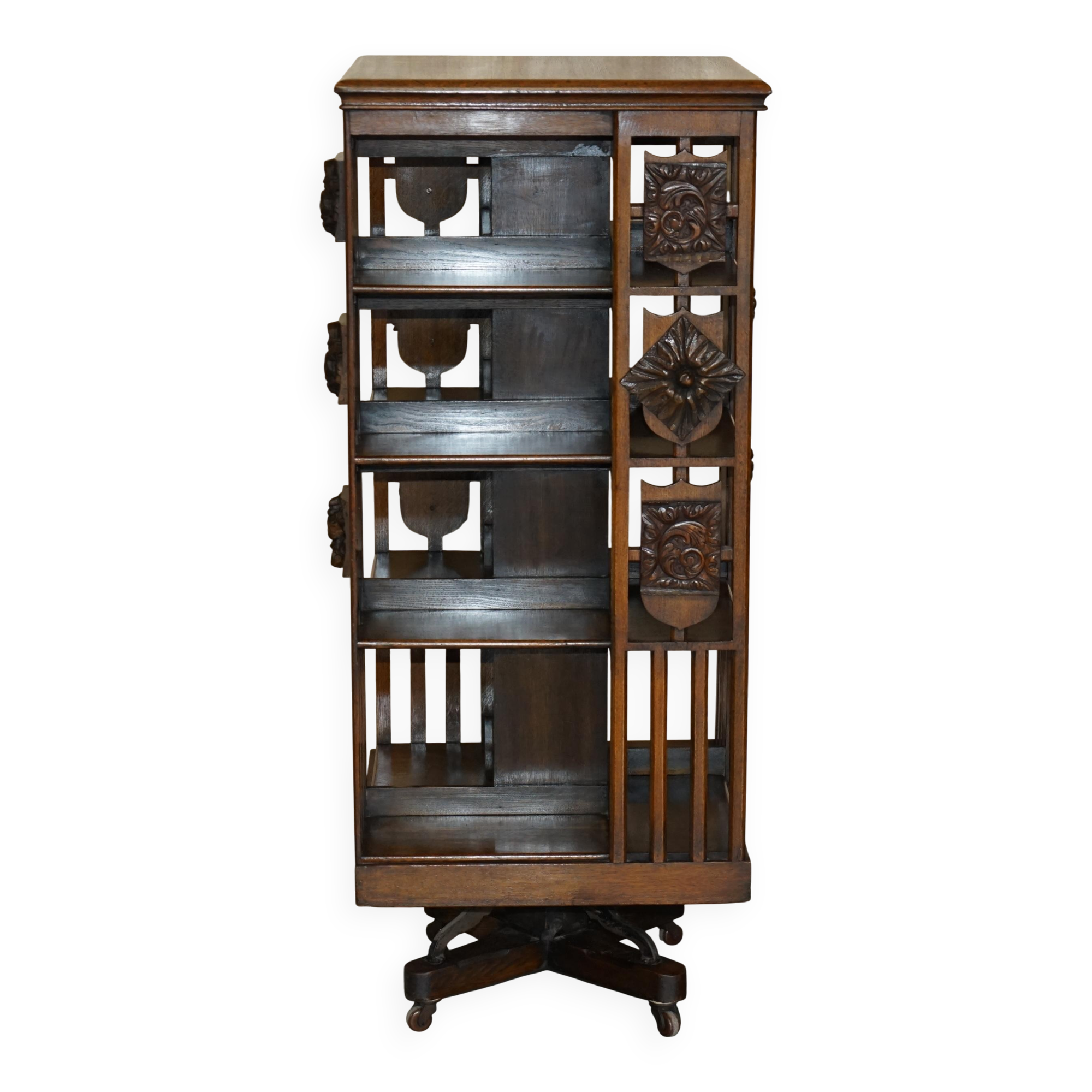 Antique Art Nouveau Victorian hand-carved revolving library.