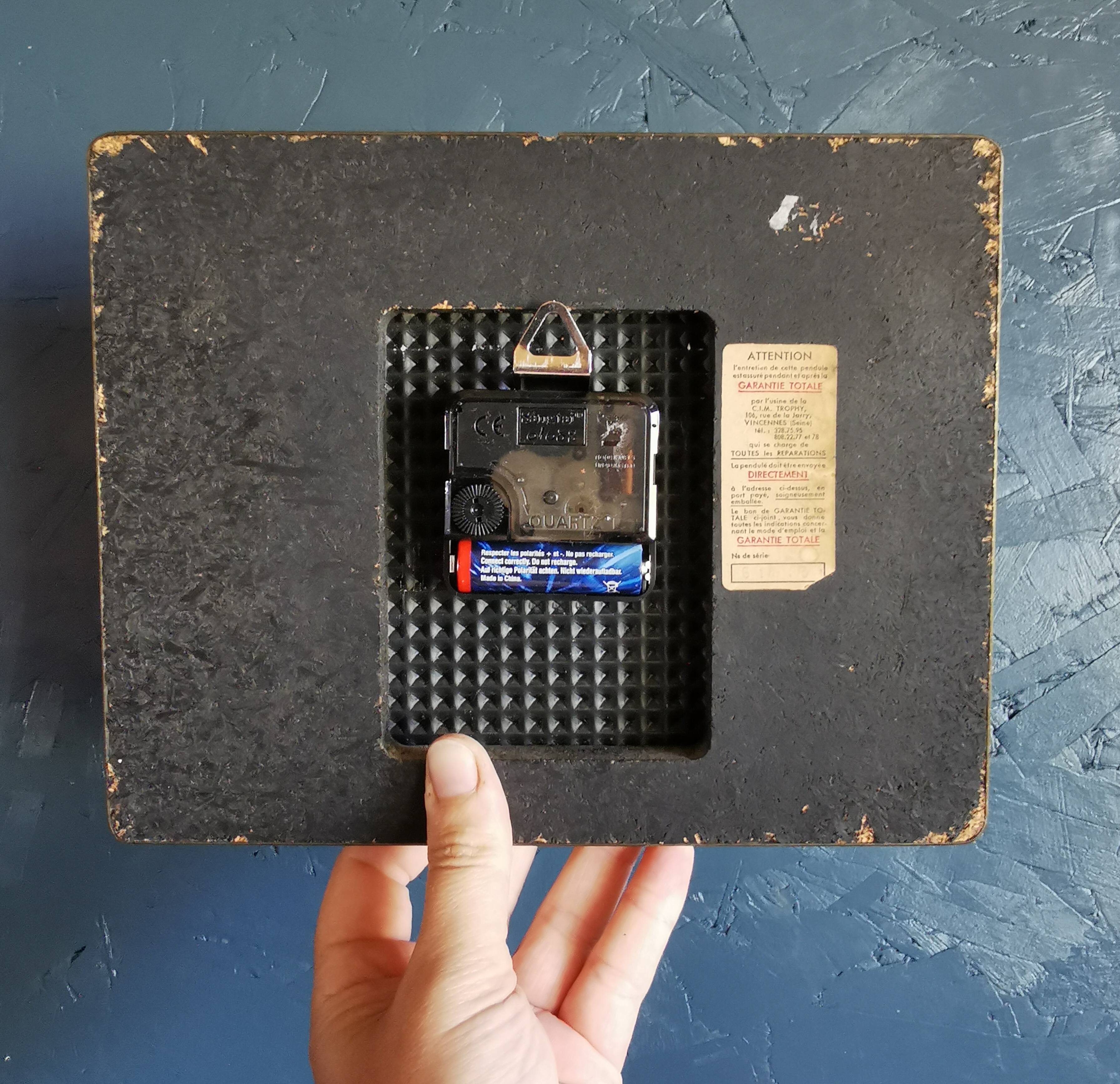 Vintage formica clock rectangular silent wall pendulum "Trophy black reliefs"