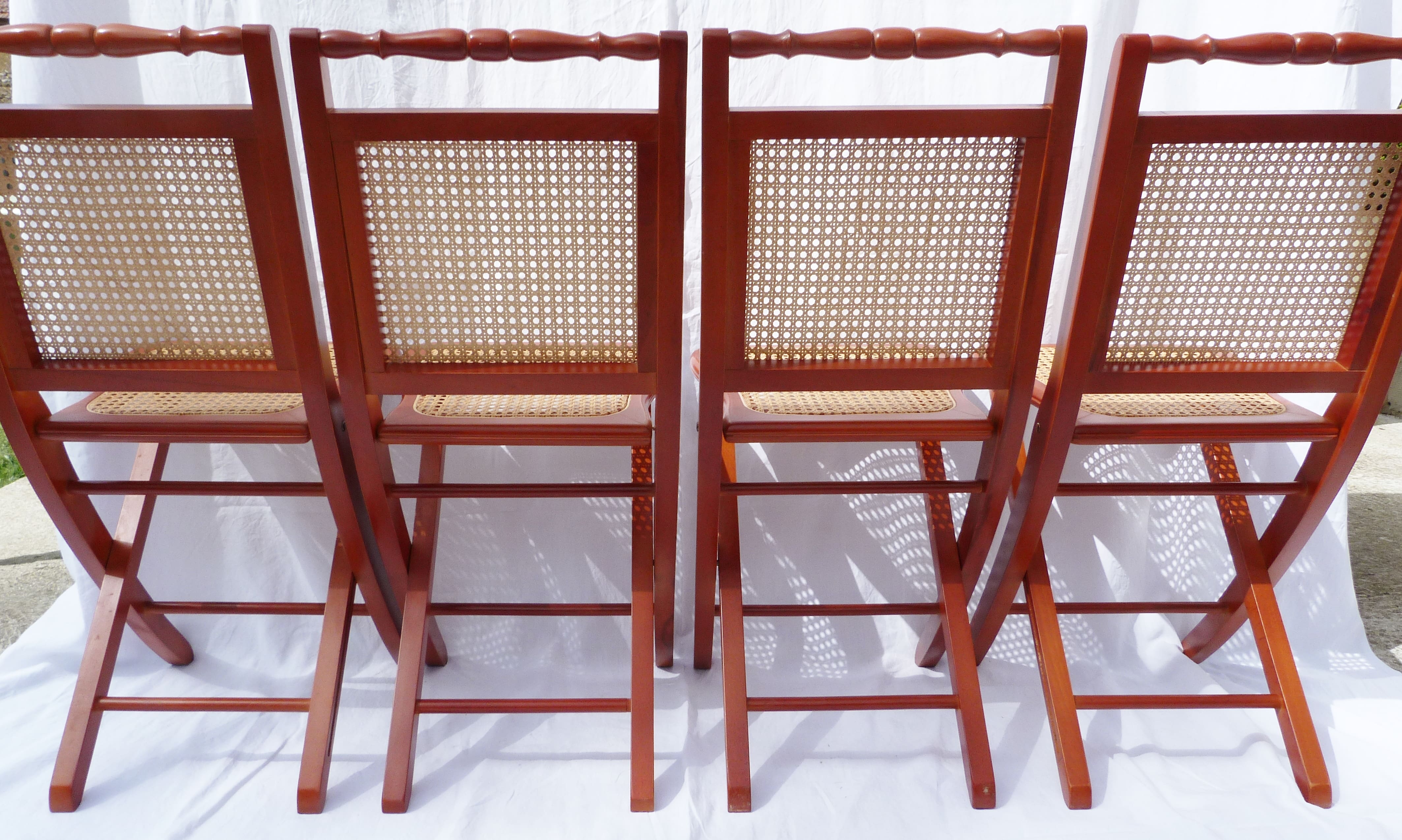 Set of 4 canned folding chairs