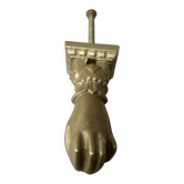 Heurtoir en bronze plein, forme de main, XIXème