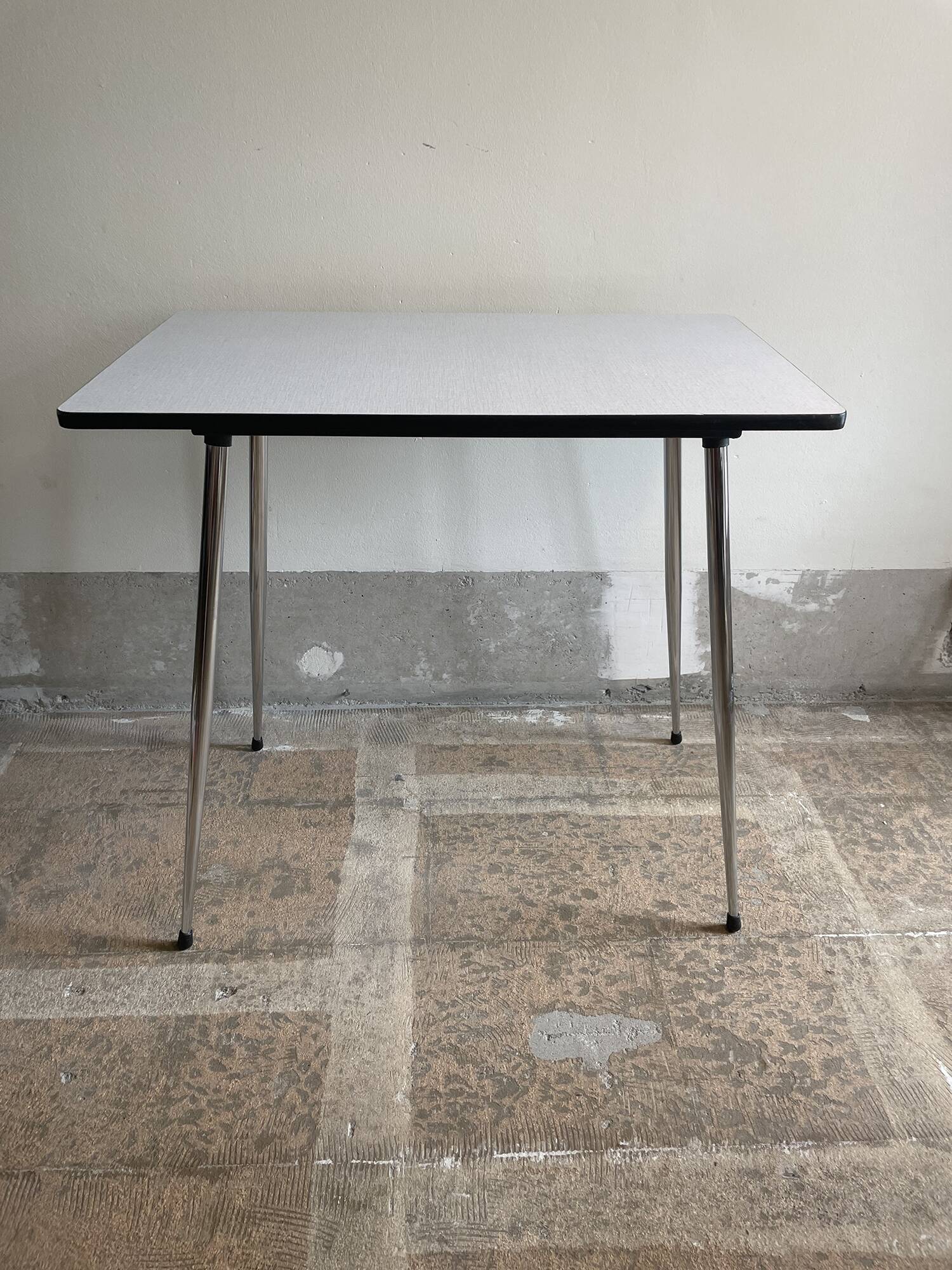 Small, gray formica table