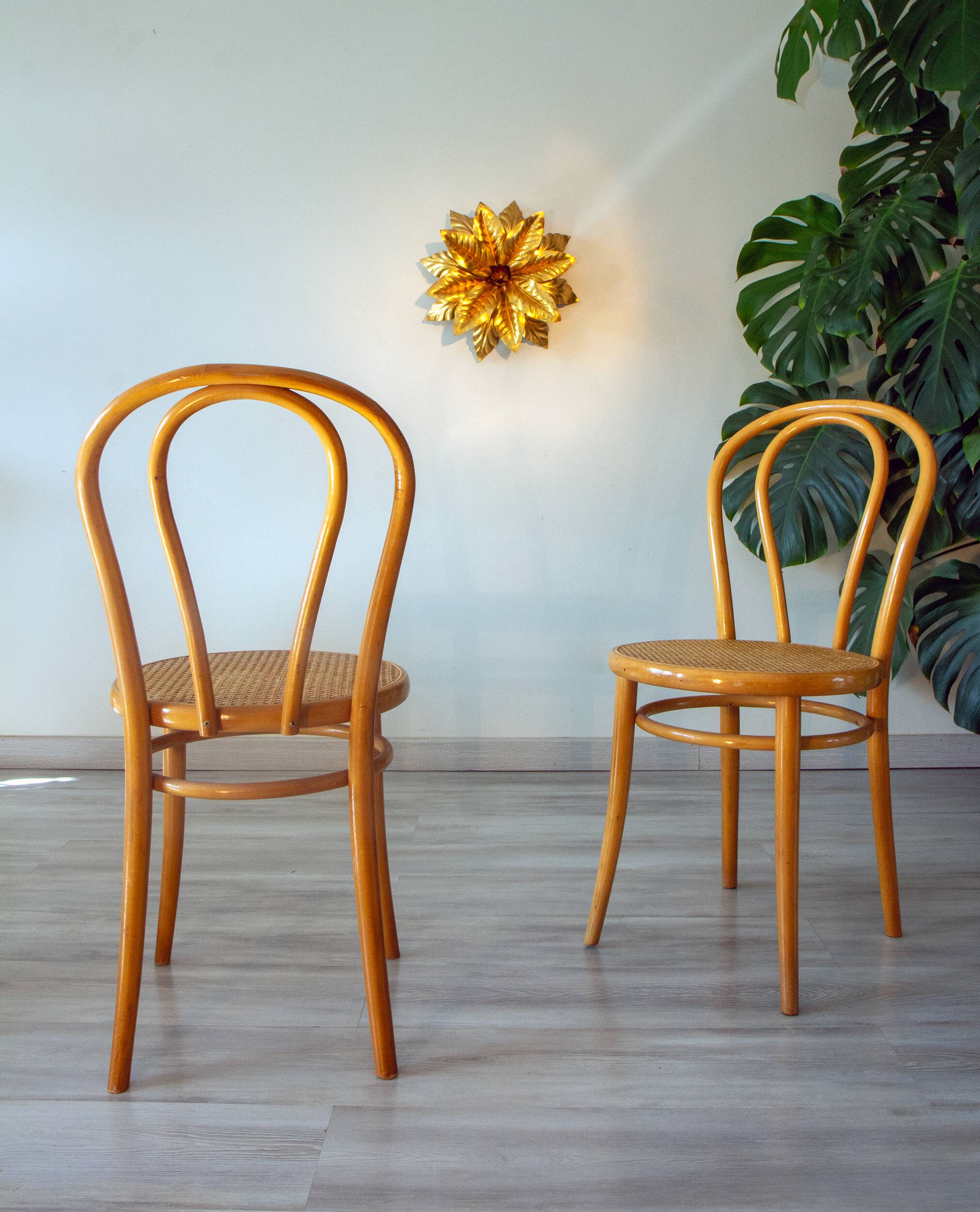 Pair of 1970s bistro chairs in bentwood and caning.