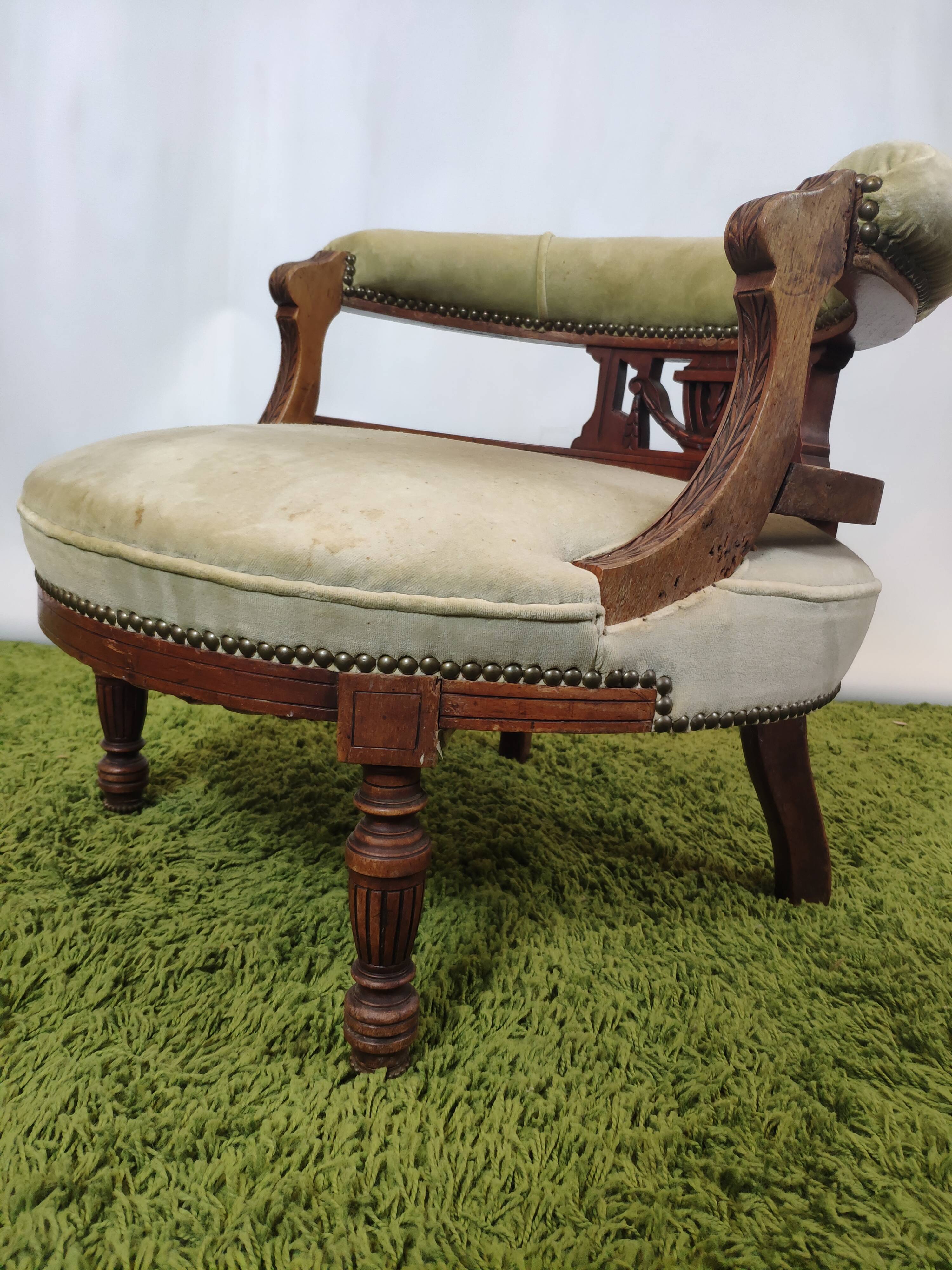 Old green velvet empire chair
