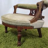 Old green velvet empire chair