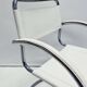 Vintage tubular frame chairs with white skai