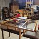 Modernist vintage square coffee table, in wood and old glass