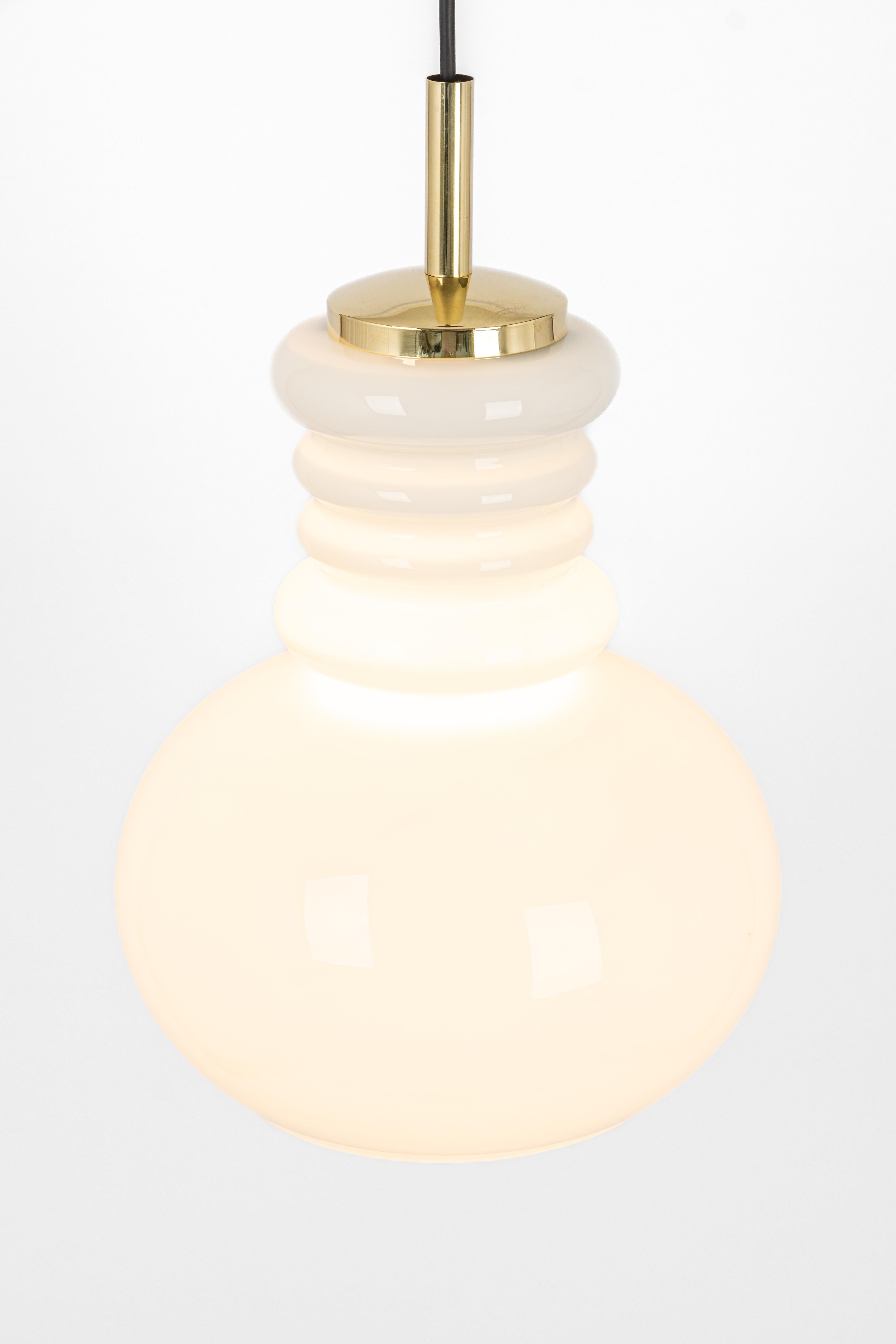 Large white opaline glass pendant light by Peill Putzler, Germany, 1970.