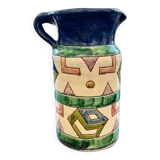 Handcrafted pitcher with graphic patterns