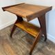 Table d'appoint sculpturale sur roulettes, bois massif, années 1950