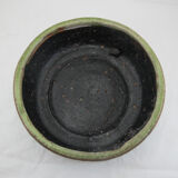 Bowl or empty pocket in cracked green sandstone varnish raku