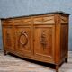 Important buffet in empire row in oak with blond patina around 1900