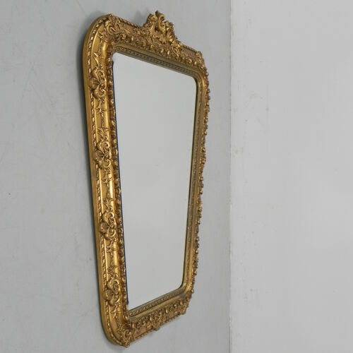 Faceted mirror in gilded frame