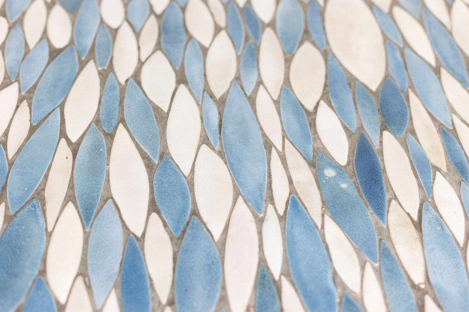 Polished metal and ceramic dining table. 1970s.