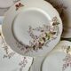 Six assiettes à entrée 1900s fleurs et papillons