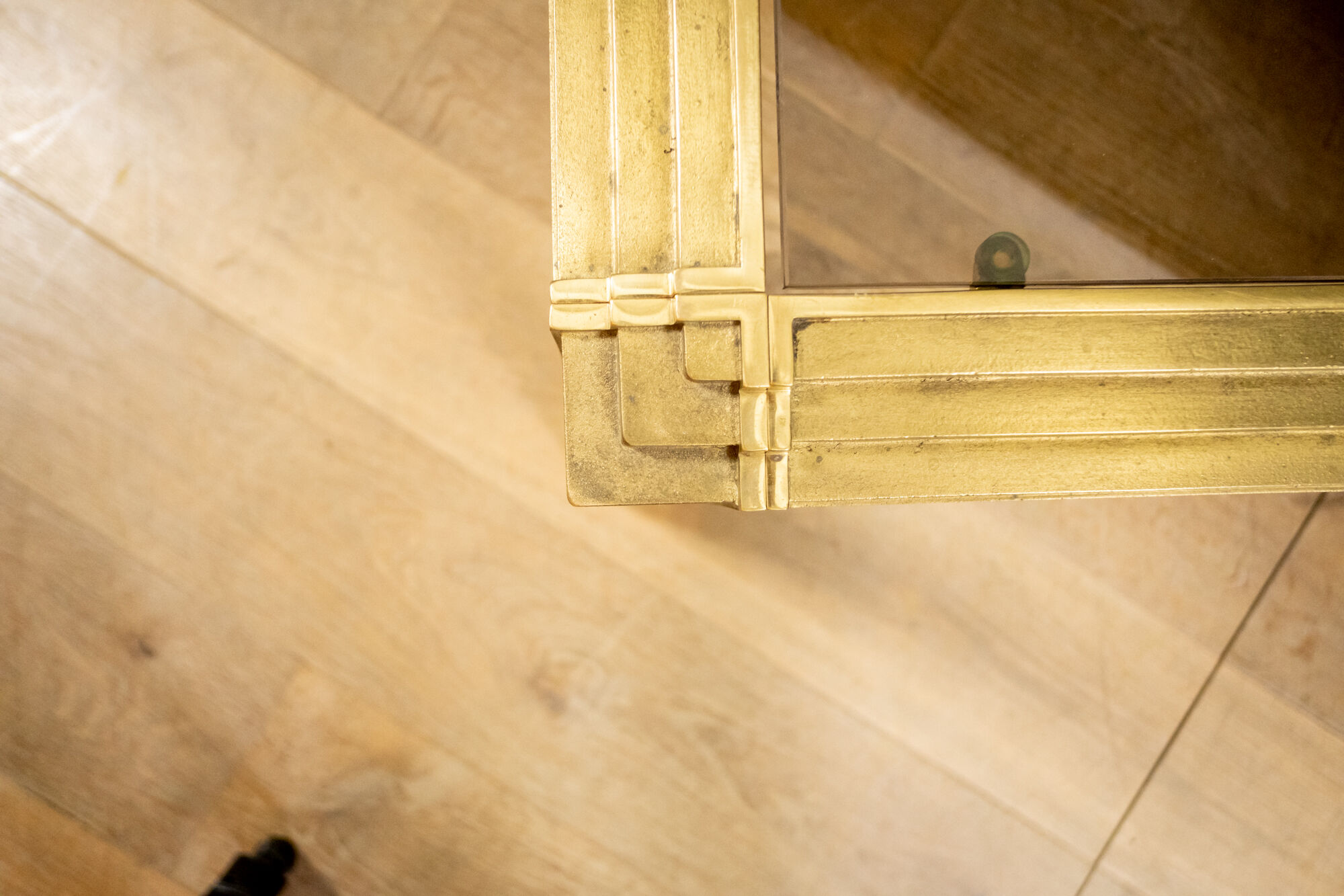 Coffee table made of brass and glass.