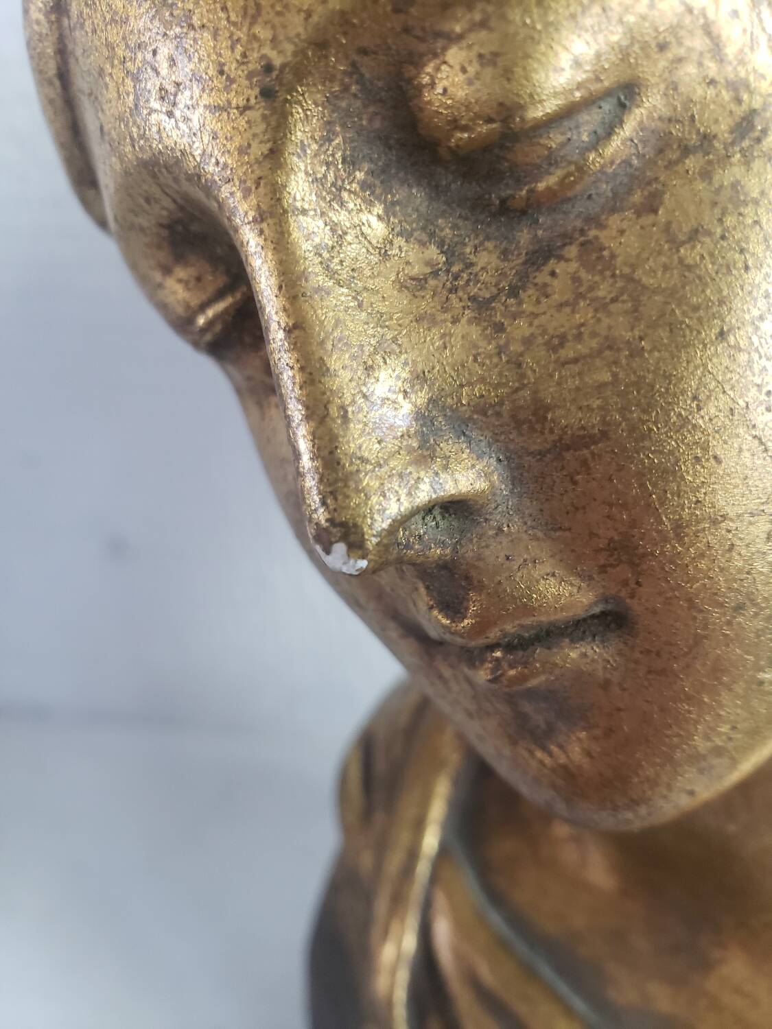 Gilded plaster bust