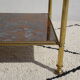 Pair of bedside tables in gilded brass and glass, midcentury
