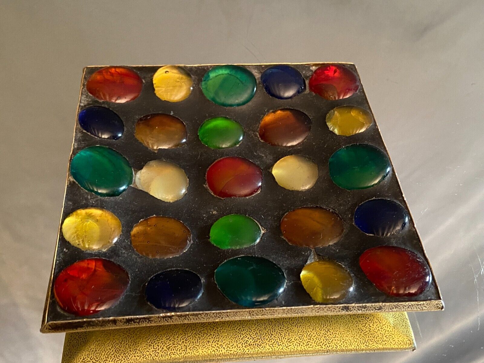 Square section cut glass and metal decorated with multicolored glass cabochons