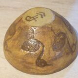 Chamotte clay bowl with bird decoration