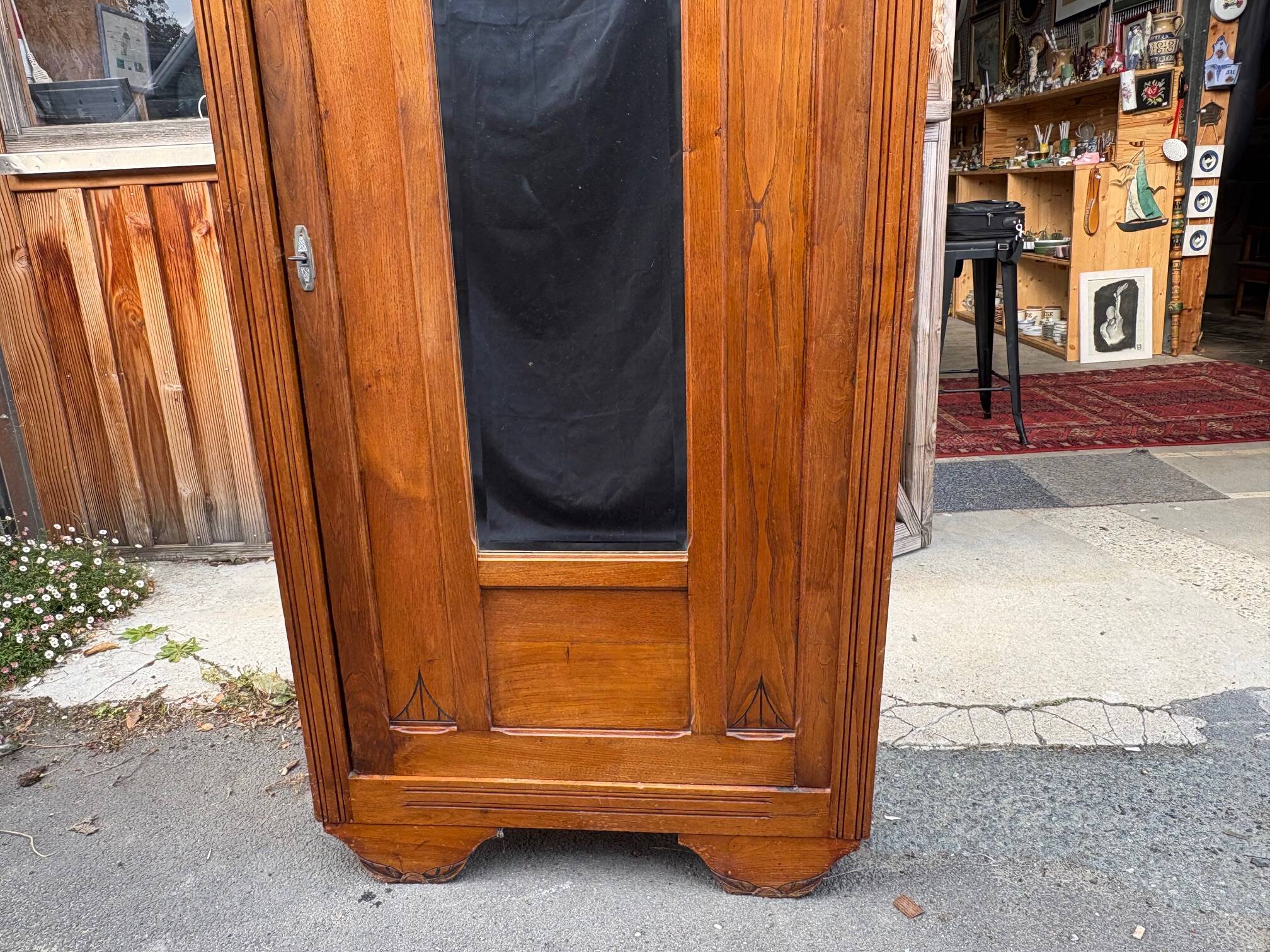 /Art Deco wardrobe with mirror in carved solid oak from the 20s/30s