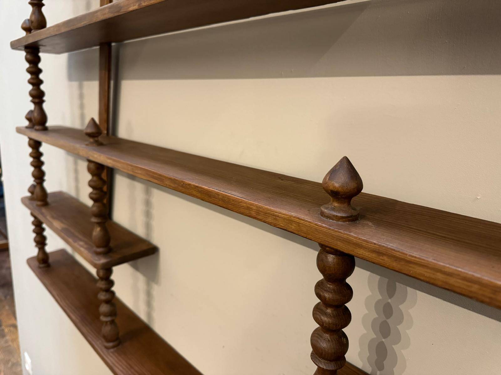 Turned wood bar wall shelf