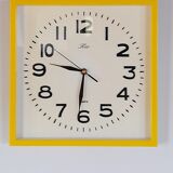 Vintage yellow plastic clock 70s