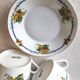 10 tea cups and creamer in Limoges porcelain