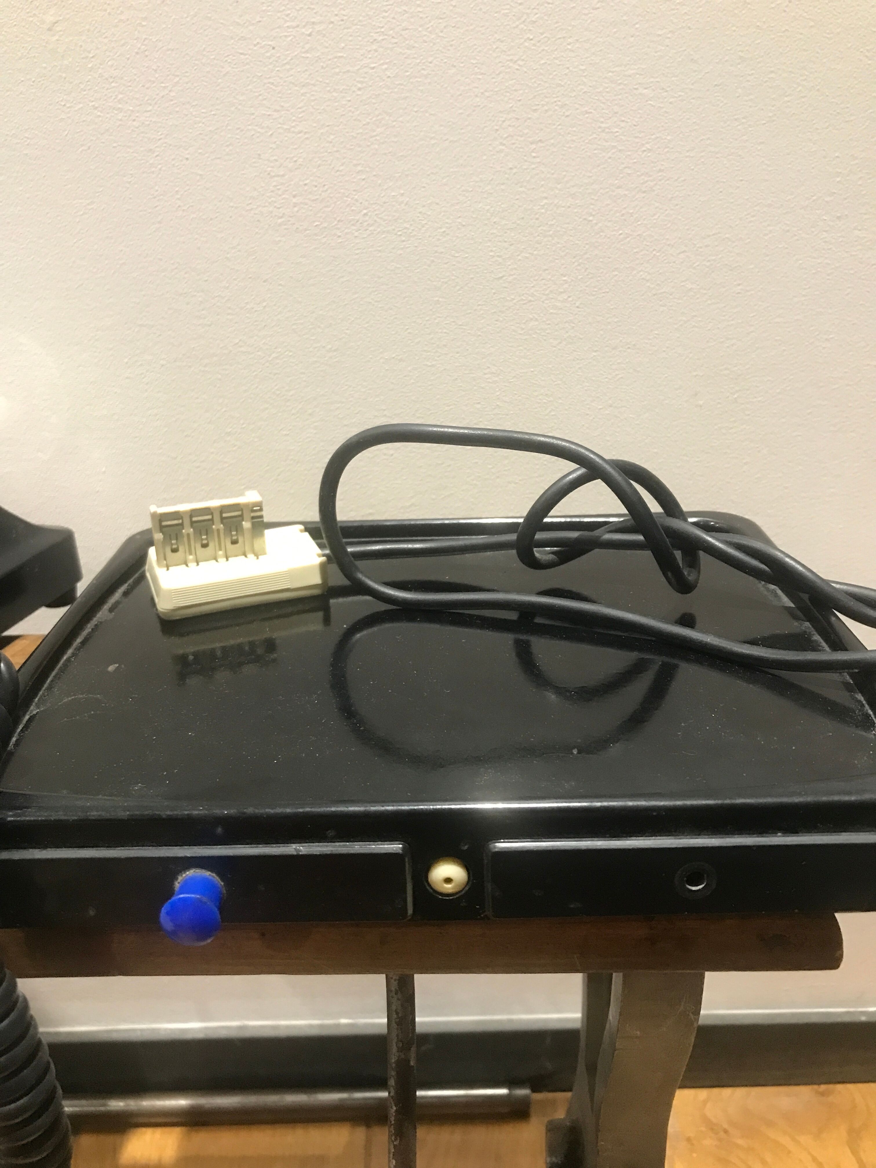 Black bakelite dial telephone with support