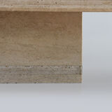 A vintage travertine coffee table
