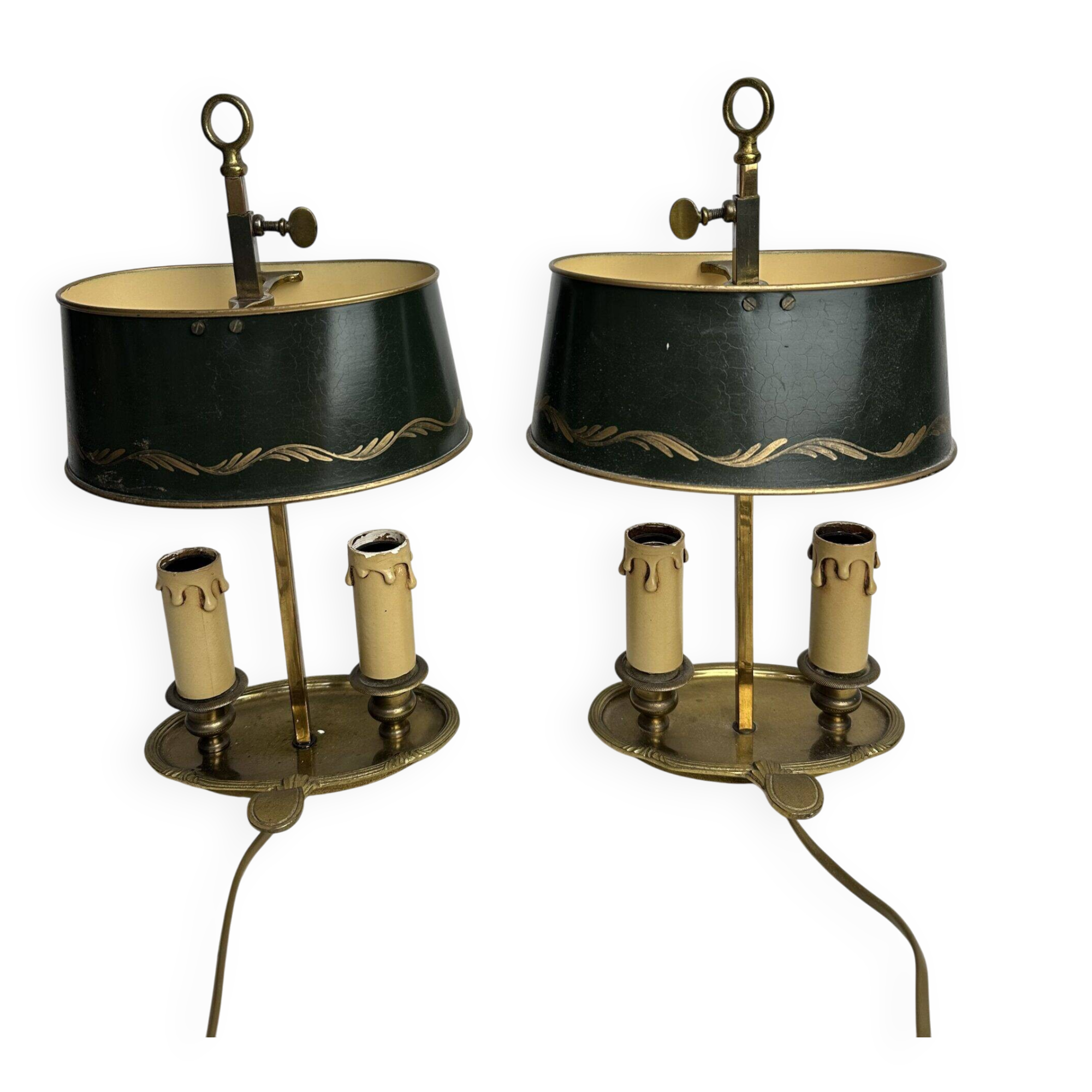 A pair of old brass bed warmers.