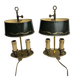 A pair of old brass bed warmers.