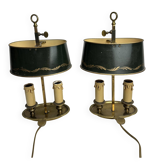 A pair of old brass bed warmers.