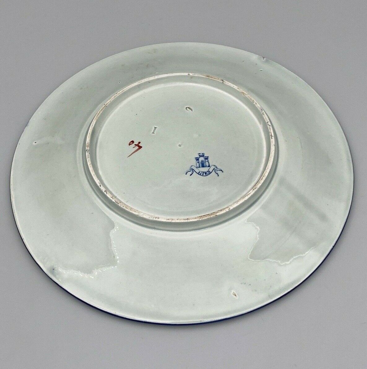 Plate gien with cornucopia decoration insect peacock butterfly