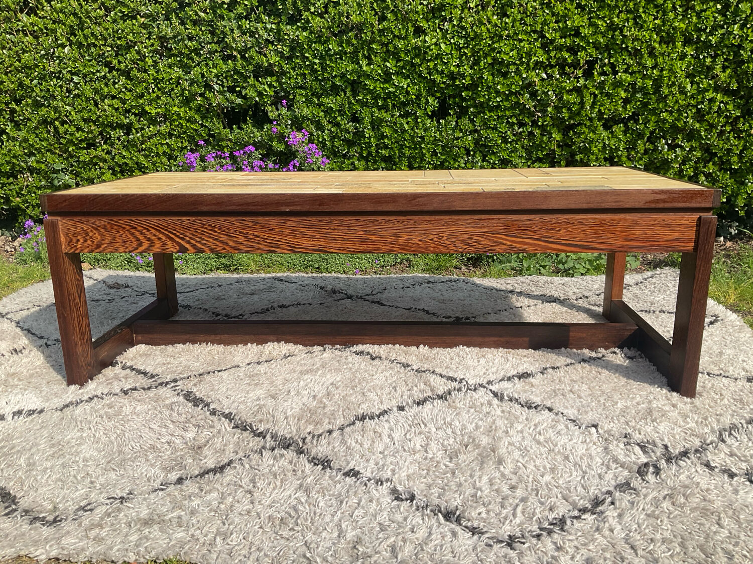 Vintage coffee table in rosewood and ceramic.