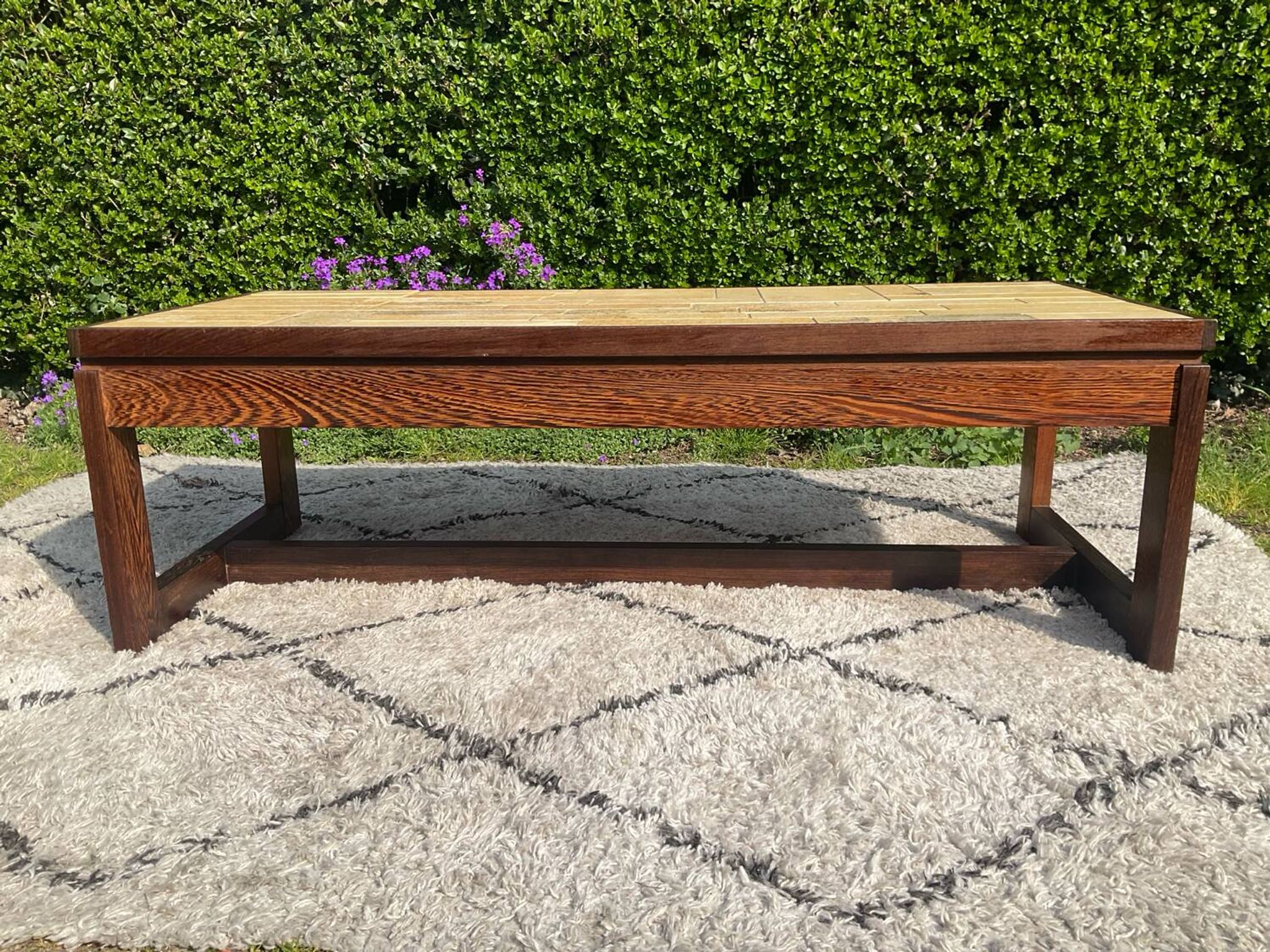 Vintage coffee table in rosewood and ceramic.