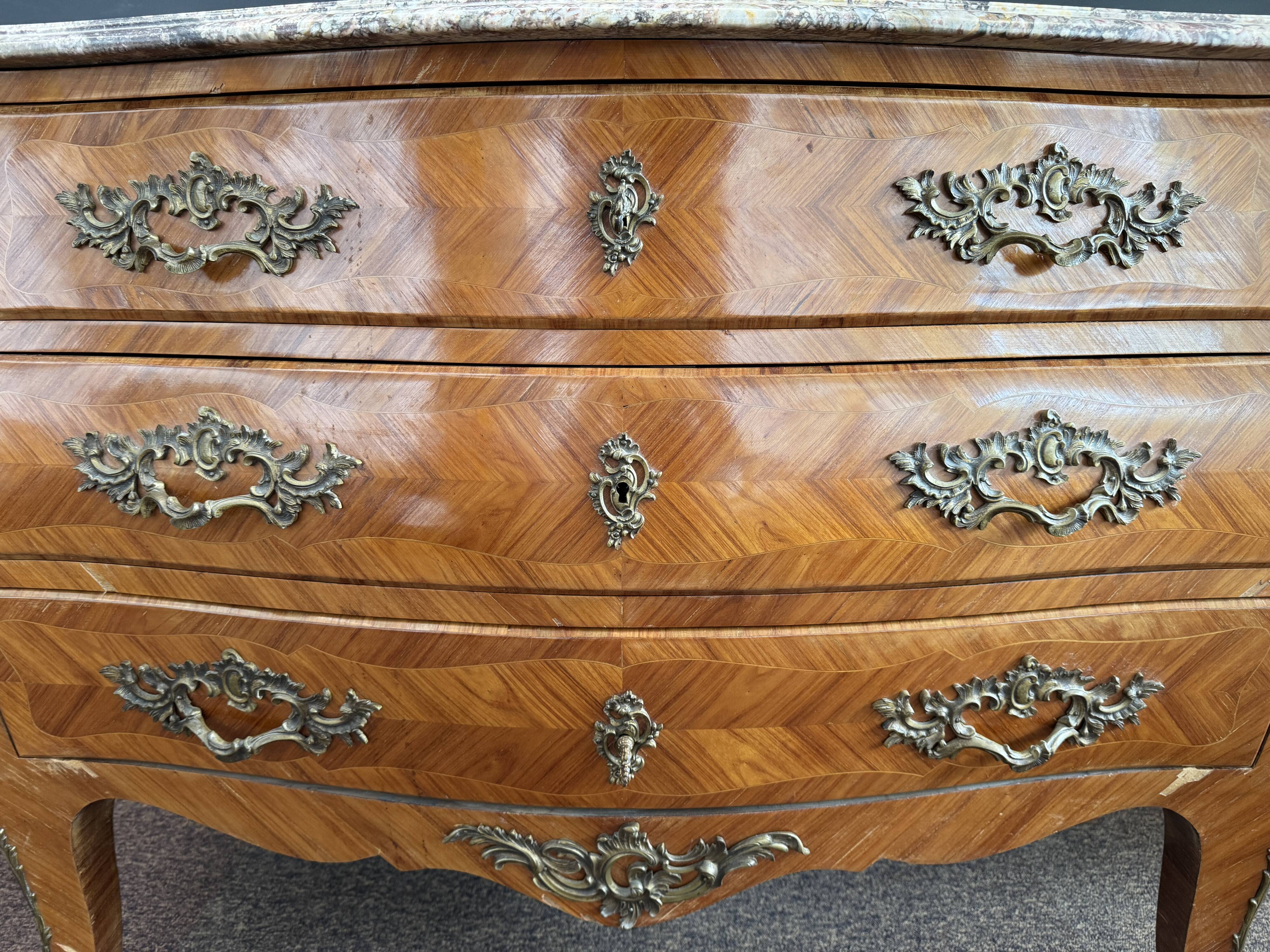 Bordeaux inlaid chest of drawers with marble and bronze ornament