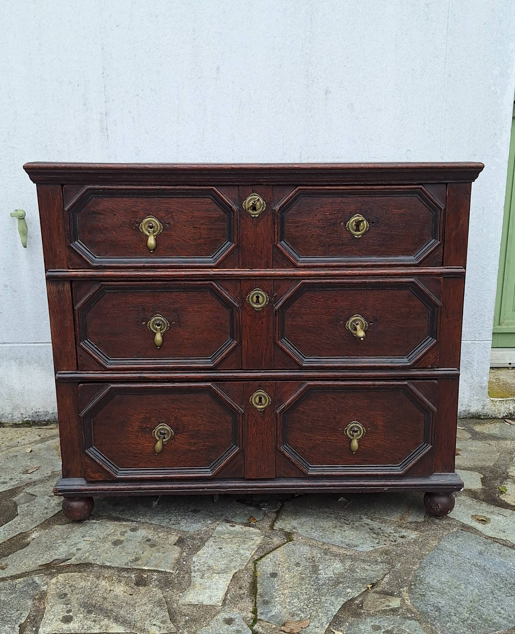 Jacobean style wooden chest of drawers