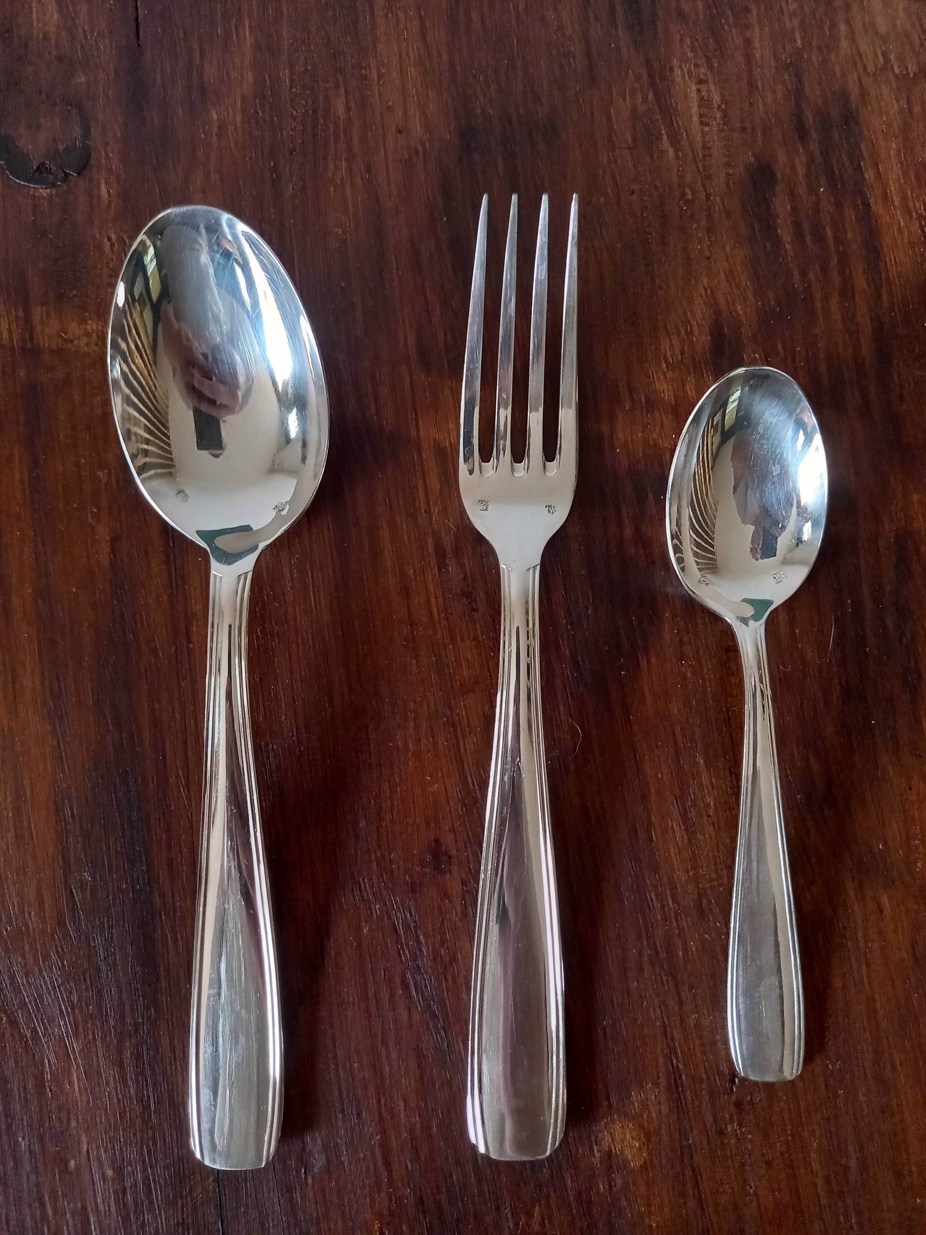 Trio of silver metal cutlery