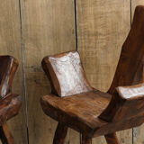 Pair of brutalist chairs made of raw wood
