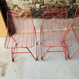 4 red design chairs