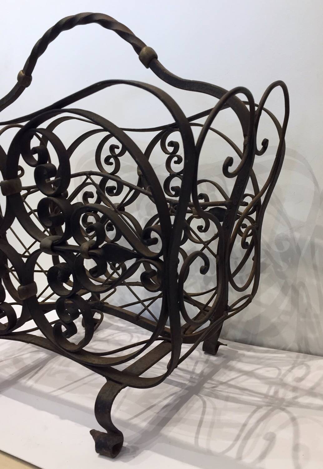 wrought iron newspaper rack