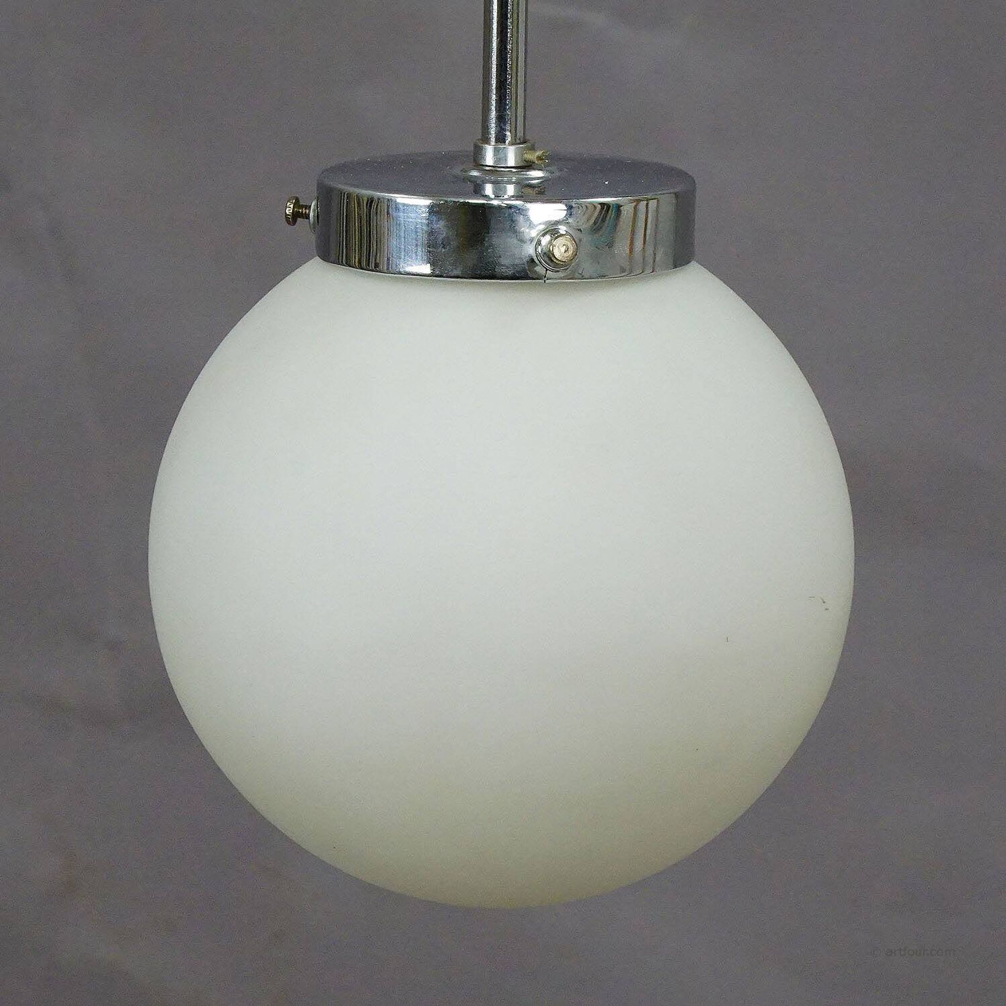 Functionalist suspension in Bauhaus style with opaline glass shade.